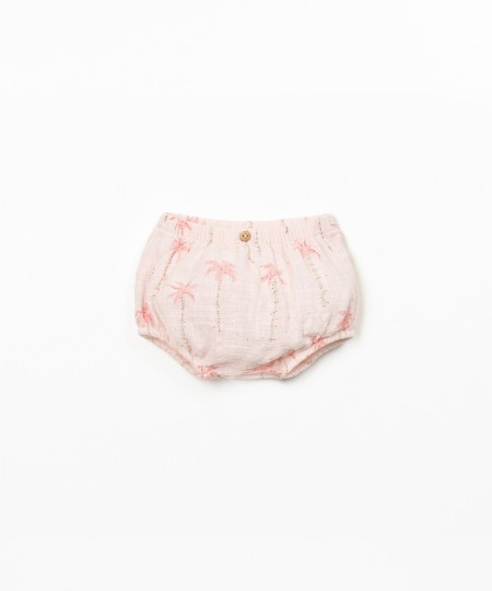 Organic cotton shorts with palm tree print