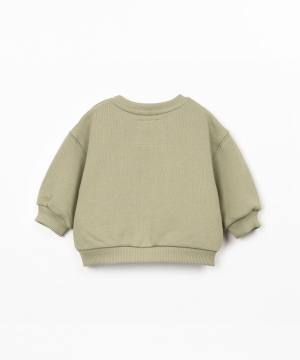 Knitted sweater with natural fibers