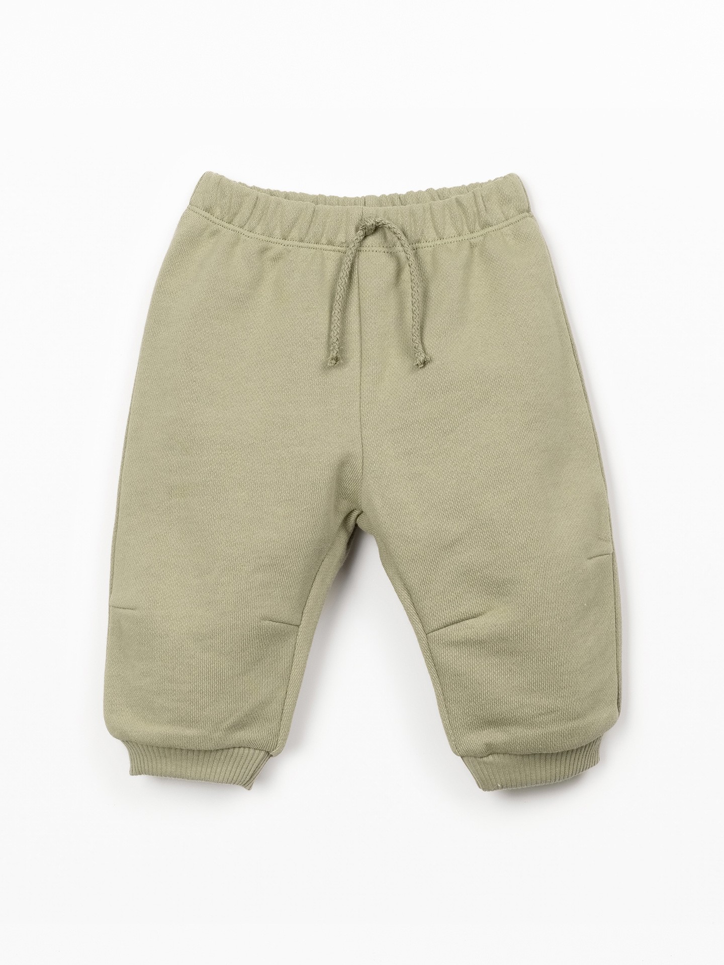 Trousers with decorative drawstring