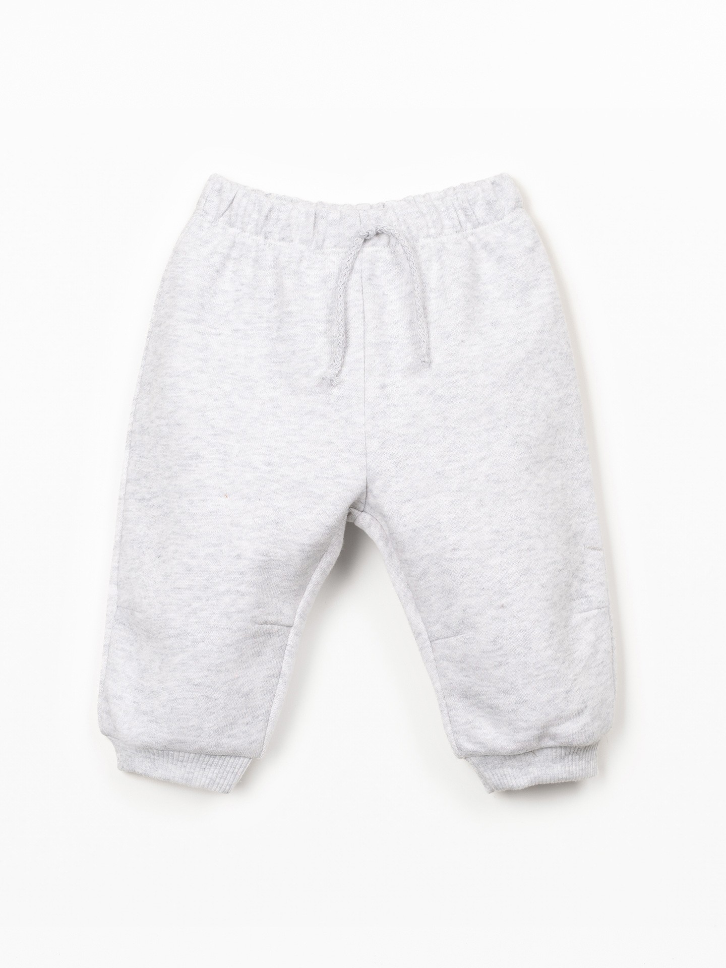 Trousers with decorative drawstring