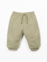 Trousers with decorative drawstring