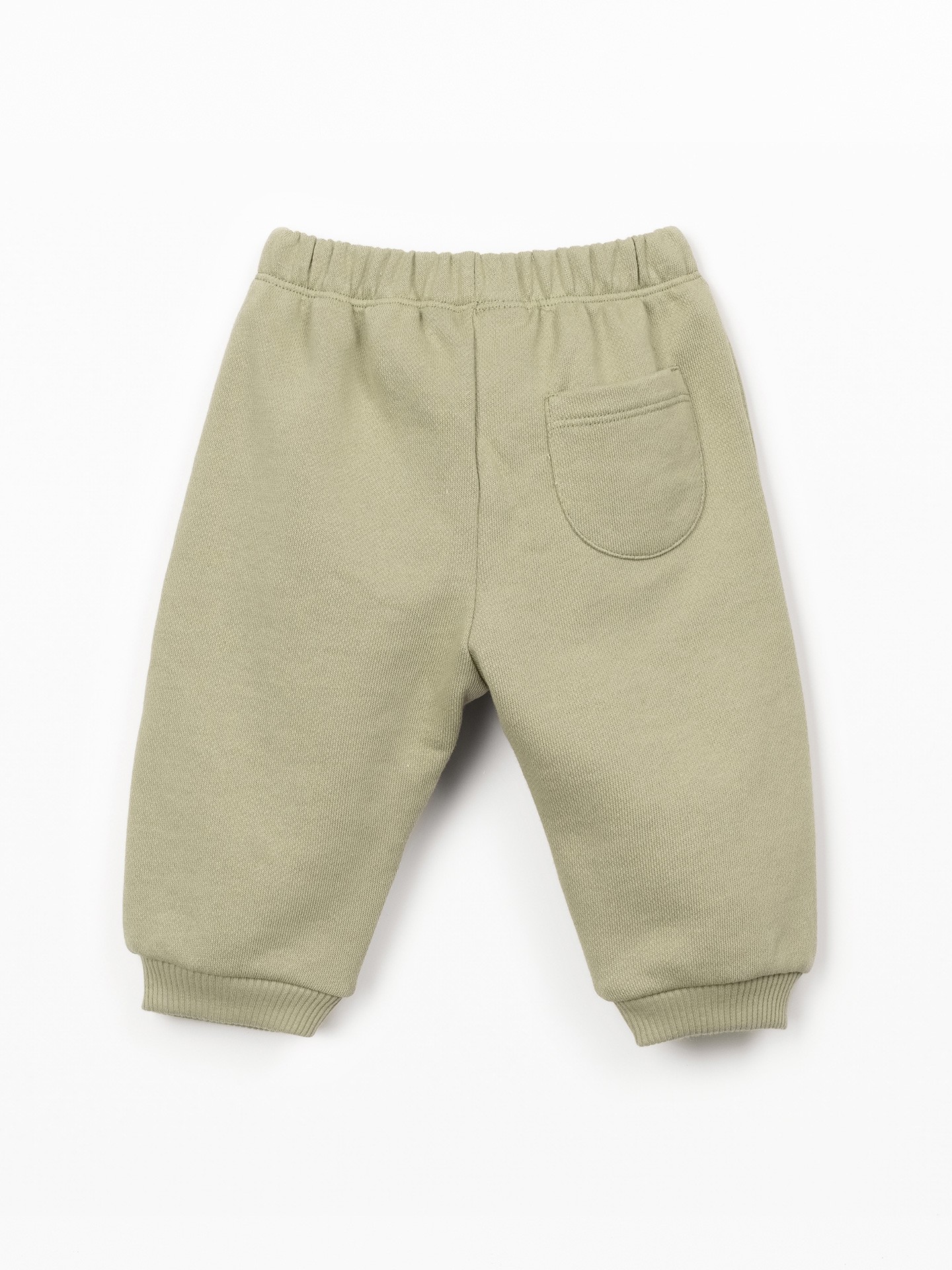 Trousers with decorative drawstring