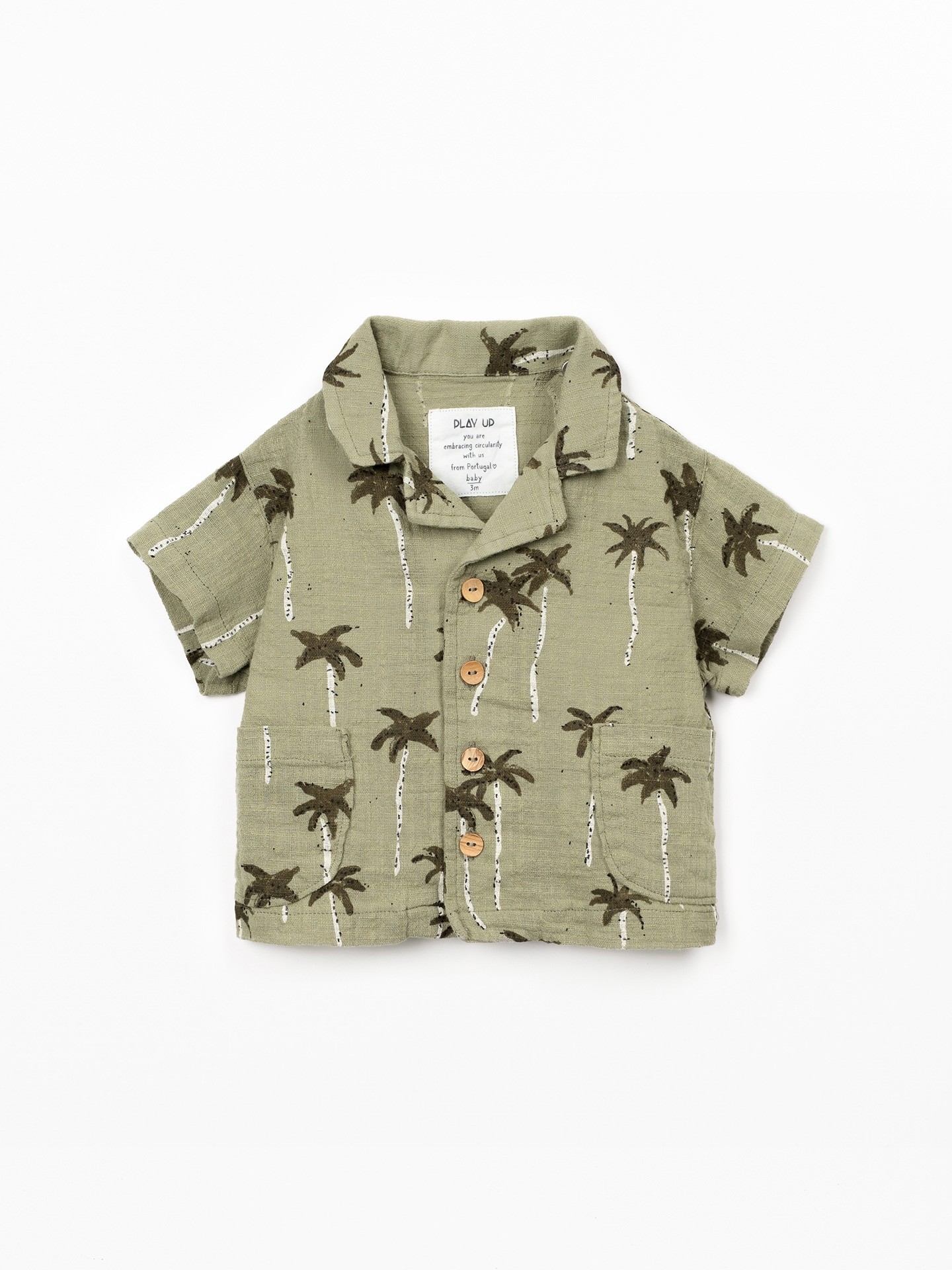 Camisa de algodão orgânico com estampado de palmeiras