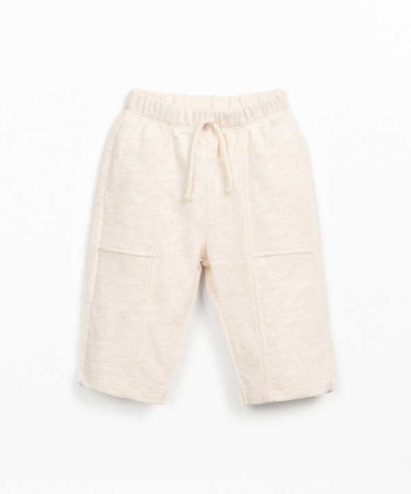 Calça de malha em algodão orgânico