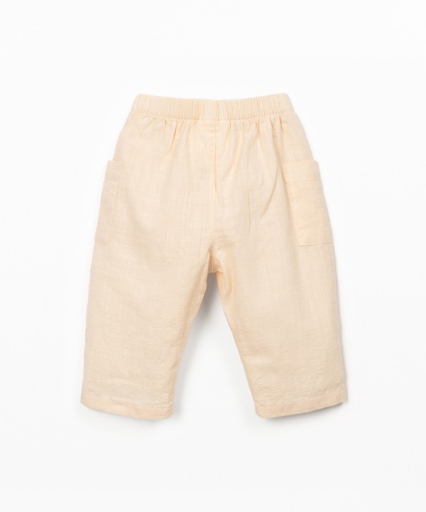 Calça de tecido em algodão orgânico