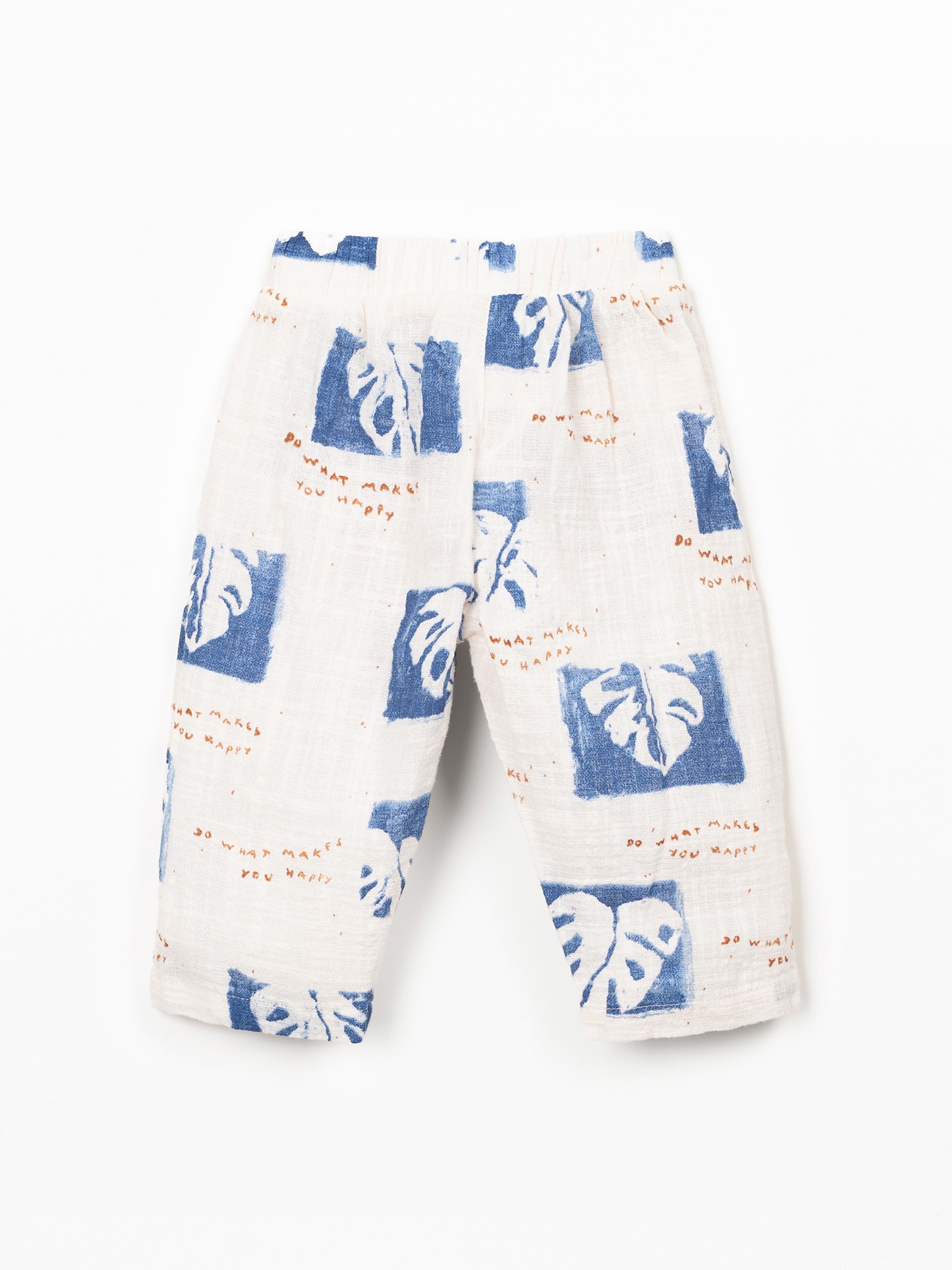 Printed fabric trousers with monstera print