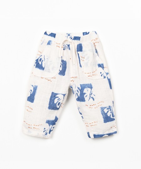 Printed fabric trousers with monstera print