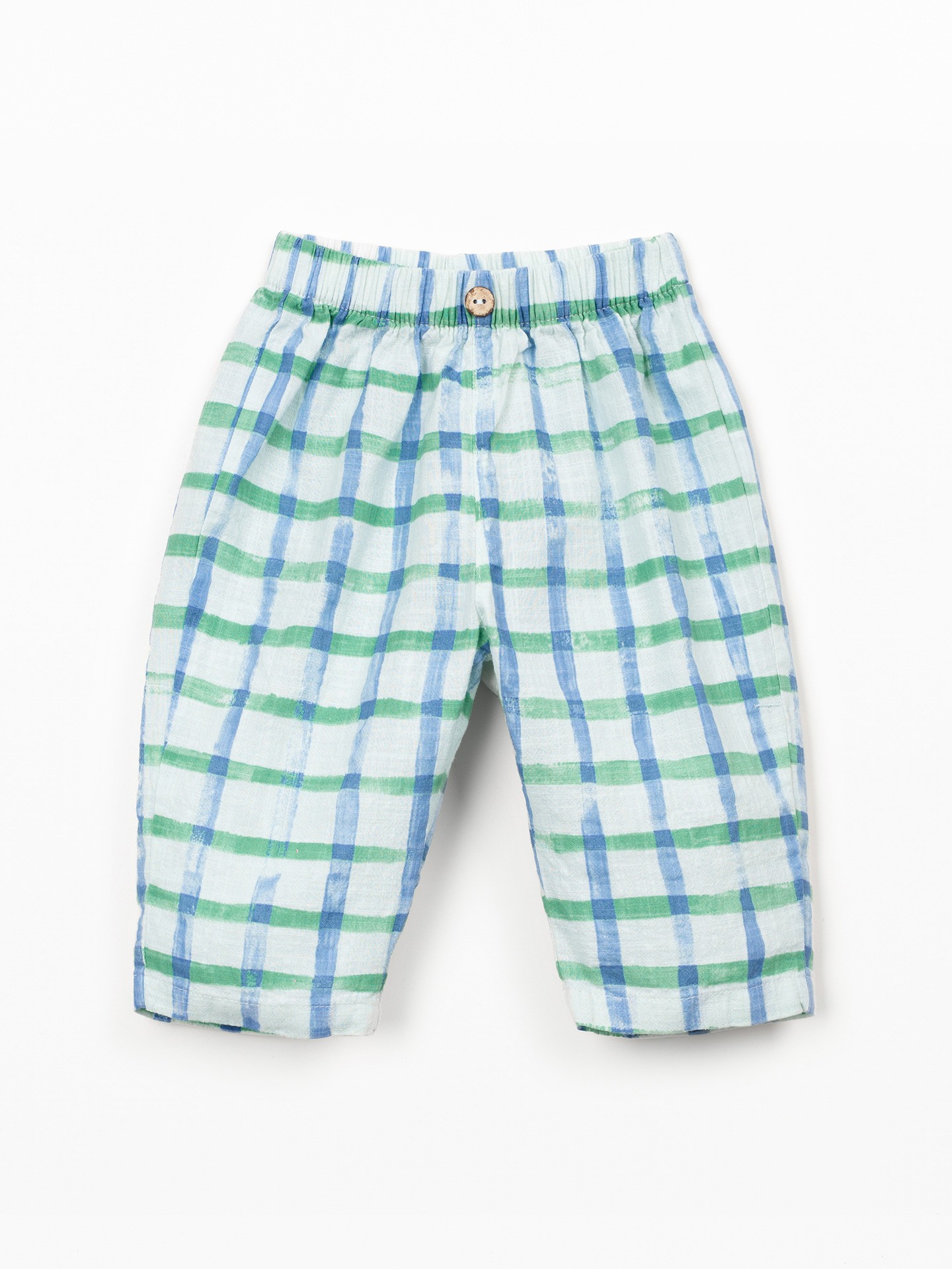 Woven trousers with natural fibers