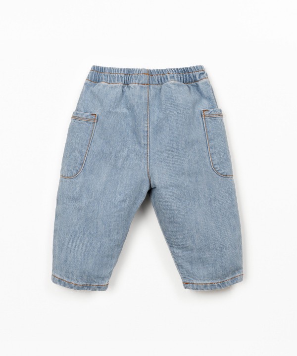 Denim trousers with side pockets