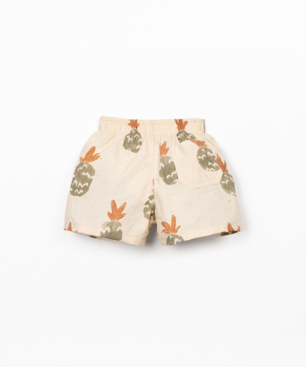 Swim shorts with palm pineapple print