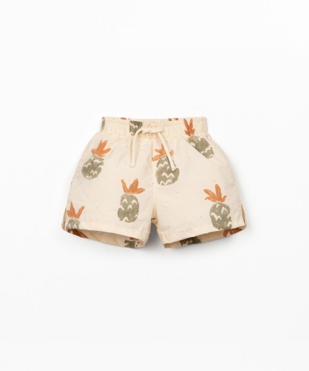 Swim shorts with palm pineapple print