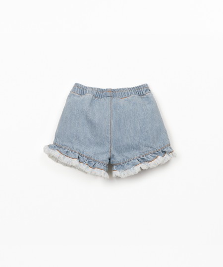 Calção de ganga com encaixe de folho