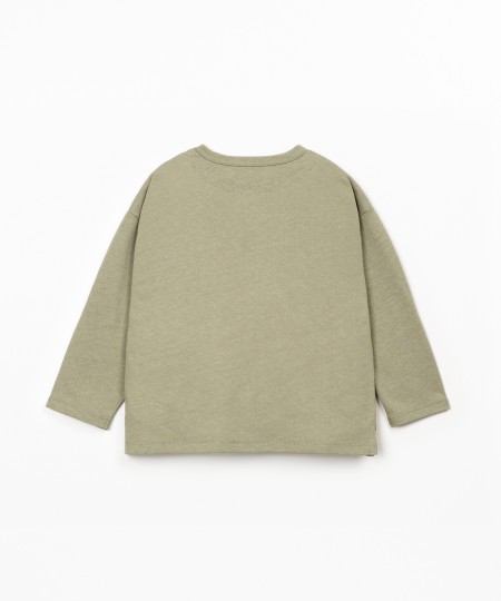 Pull à manches longues avec poche poitrine