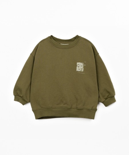 Sweat-shirt avec illustration dans le dos