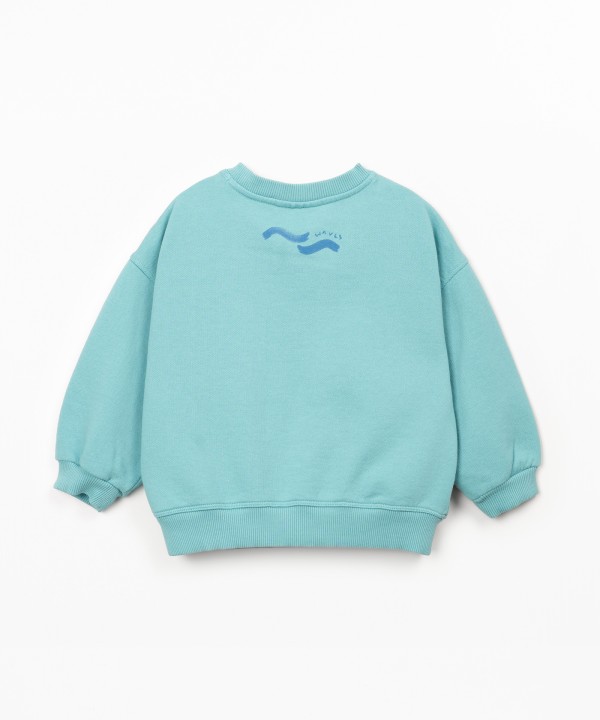 Sweatshirt with illustration on the back