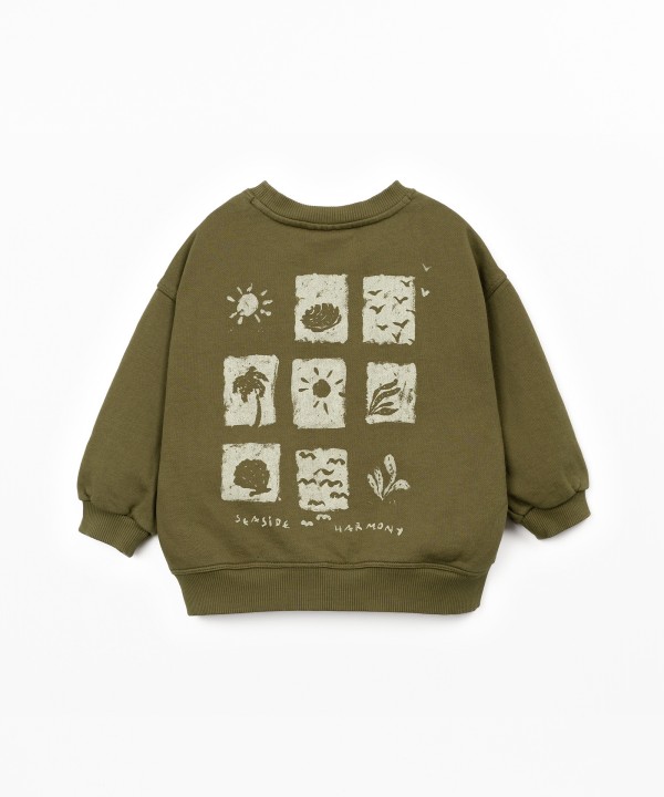 Sweatshirt with illustration on the back