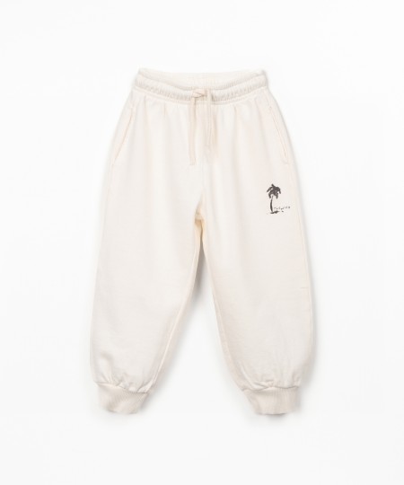 Trousers in natural fibers with print