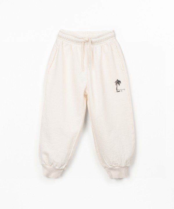 Trousers in natural fibers with print