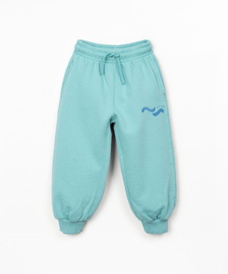 Trousers in natural fibers with print