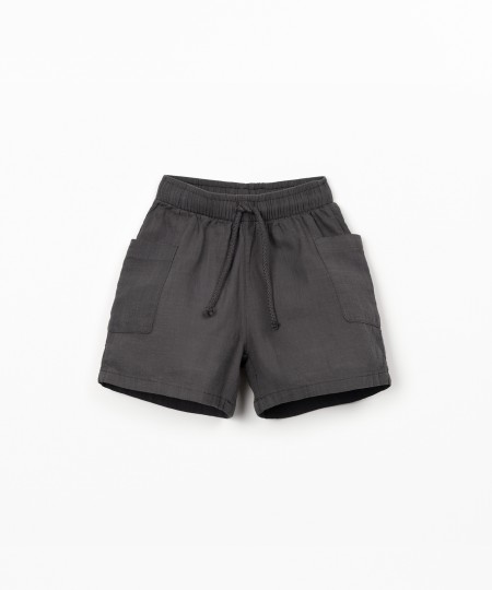 Fabric shorts with adjustable drawstring