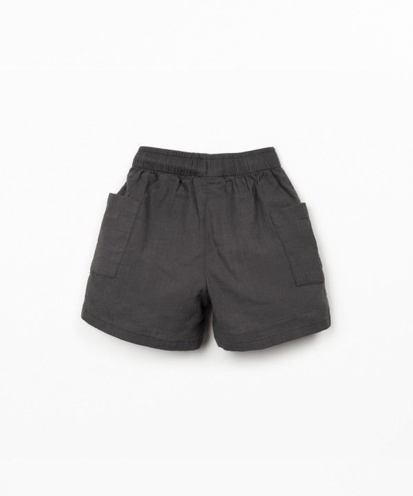 Fabric shorts with adjustable drawstring