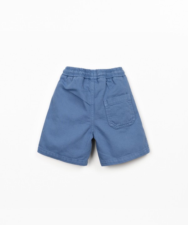 Cal��o de sarja com bolsos e cord�o ajust�vel