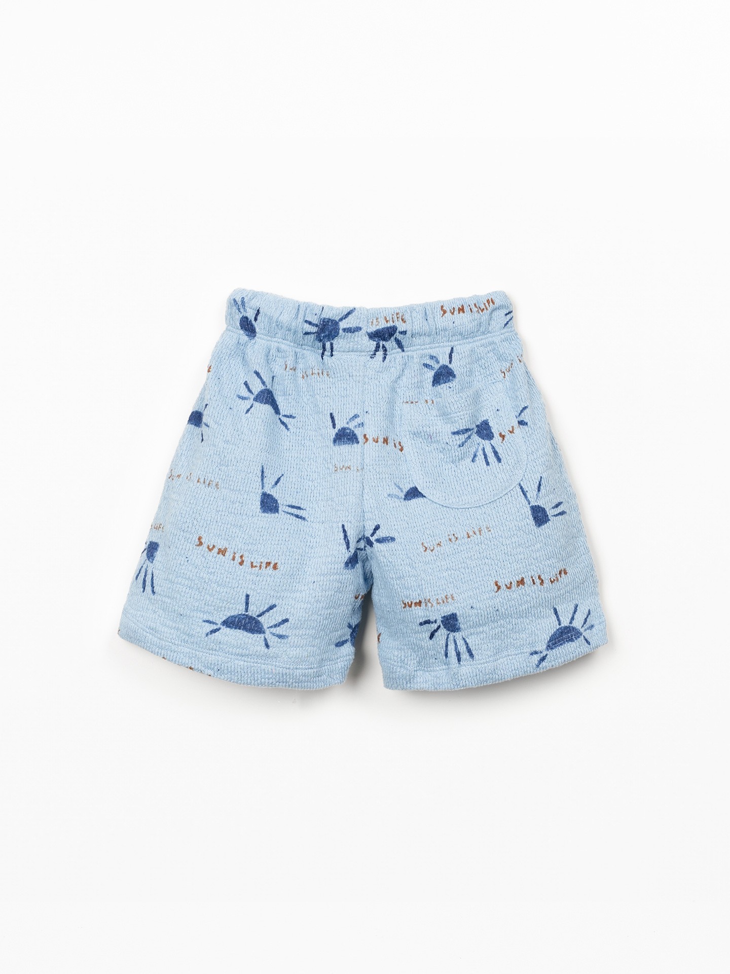 Pantalón corto de punto con estampado de sol