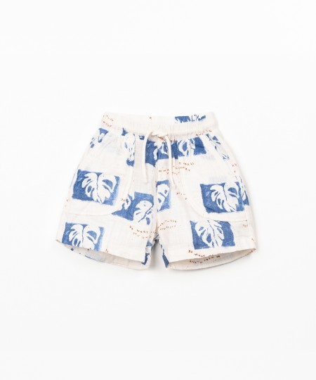 Organic cotton shorts with monstera print
