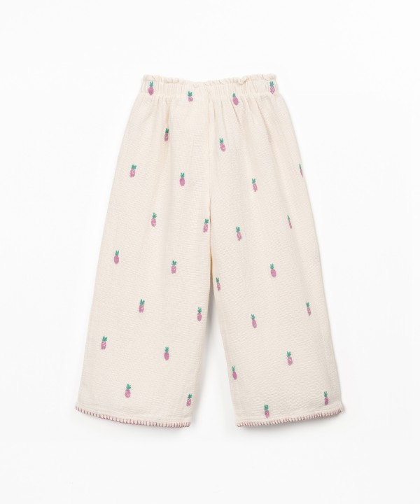 Printed fabric trousers with pineapples