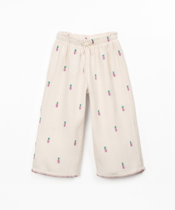Printed fabric trousers with pineapples