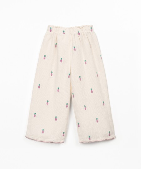 Printed fabric trousers with pineapples