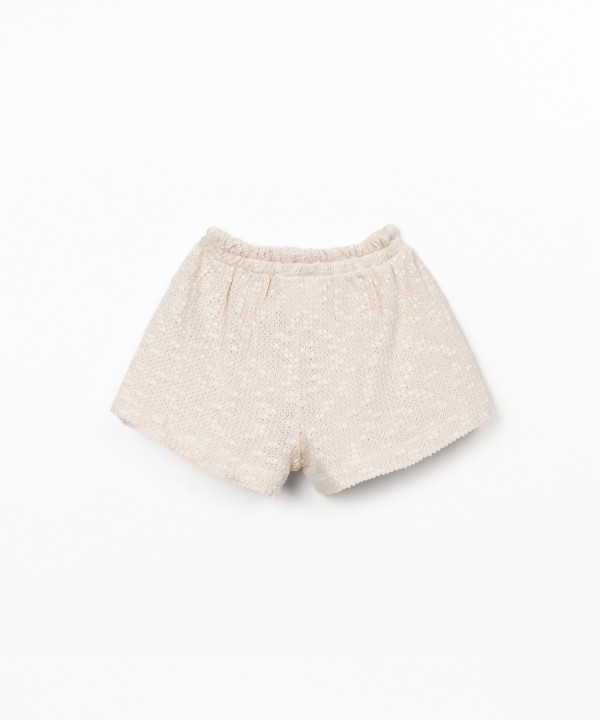 Jersey shorts with crochet effect