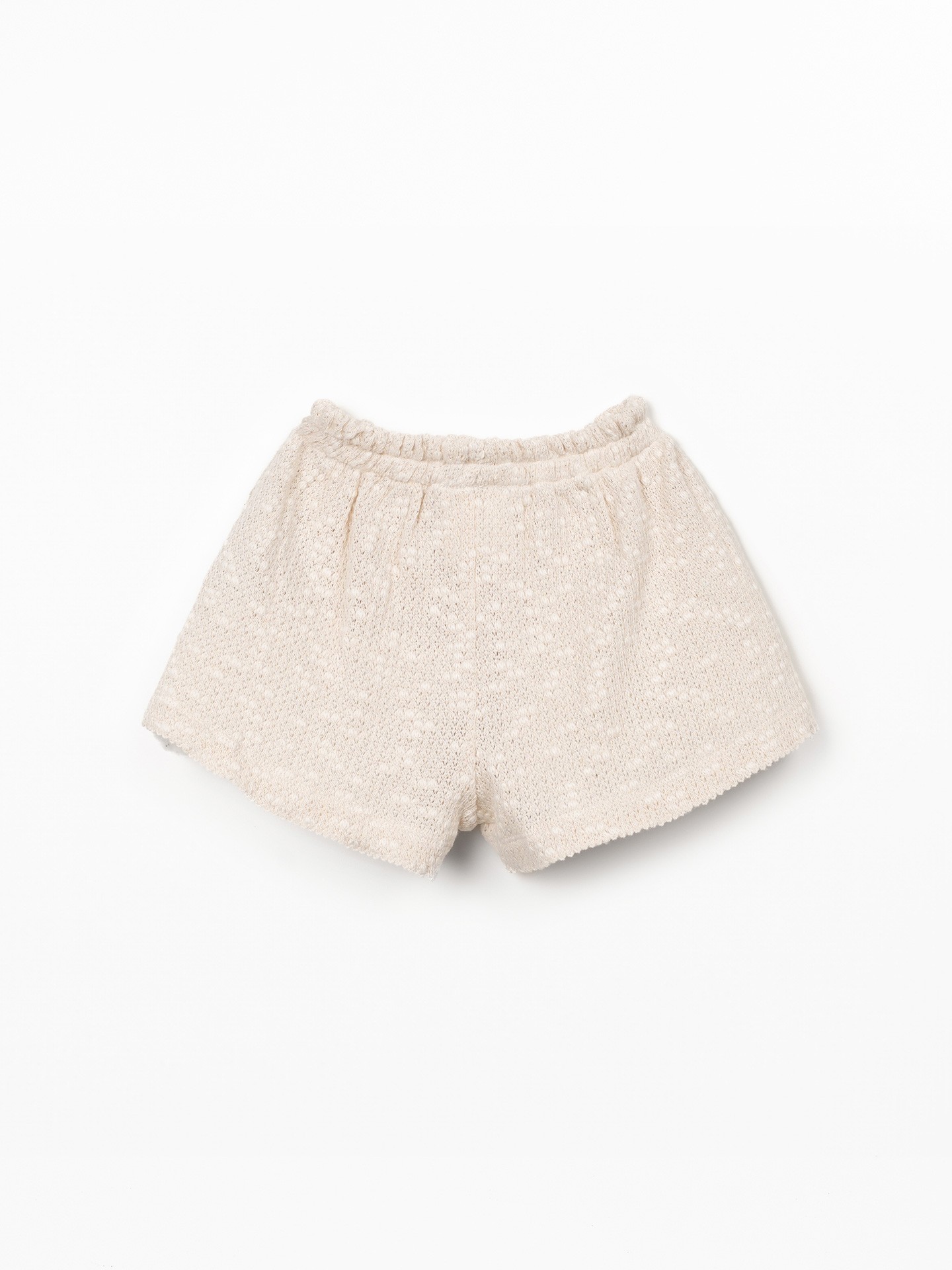 Jersey shorts with crochet effect