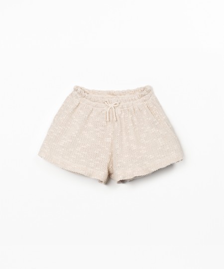 Jersey shorts with crochet effect