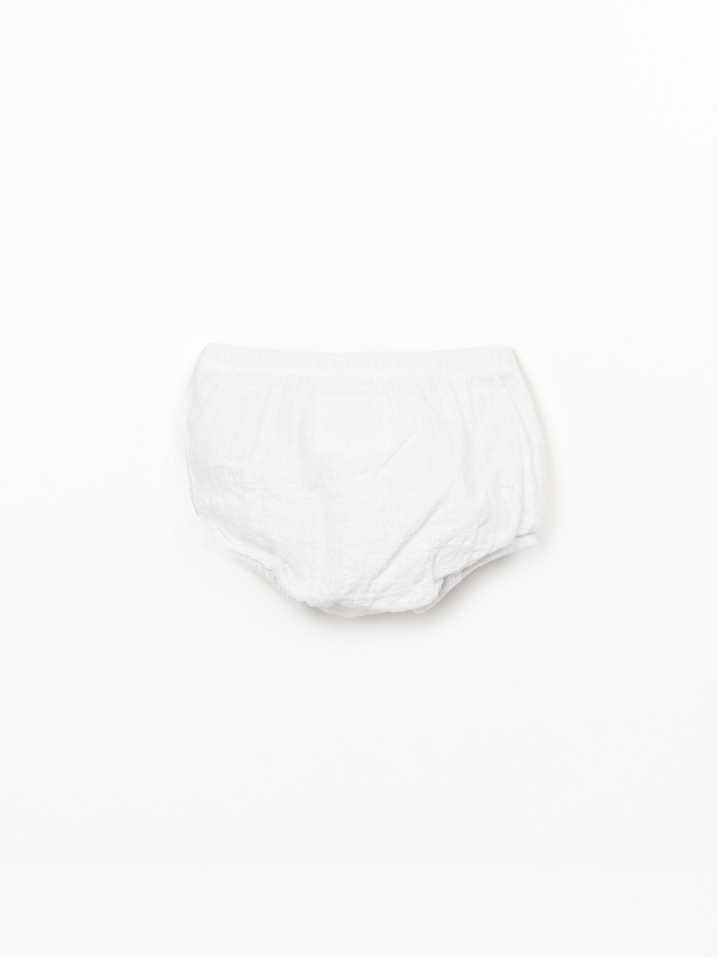 Pantalones cortos de tela con bolsillo