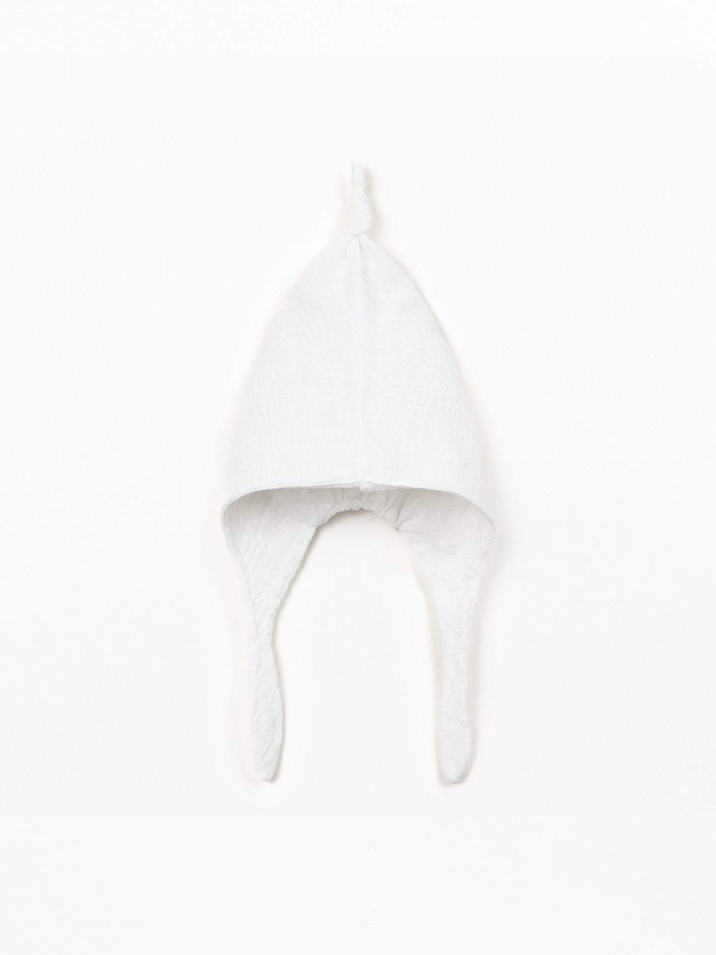 Cappellino in tessuto di cotone biologico