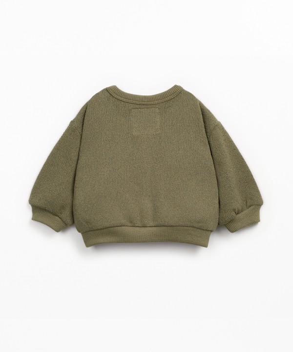 Cardigan in jersey with Re(Play) yarn