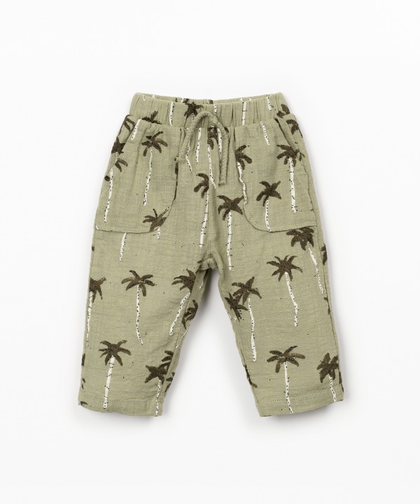 Printed fabric trousers with tree print