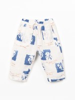 Pantaloni in tessuto con stampa di monsteras Pantaloni in tessuto con stampa di monsteras