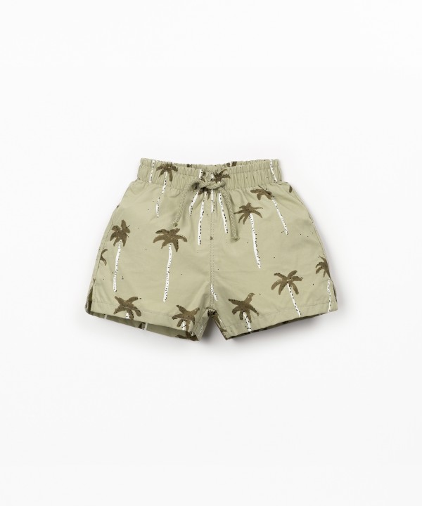 Short de bain à imprimé palmiers
