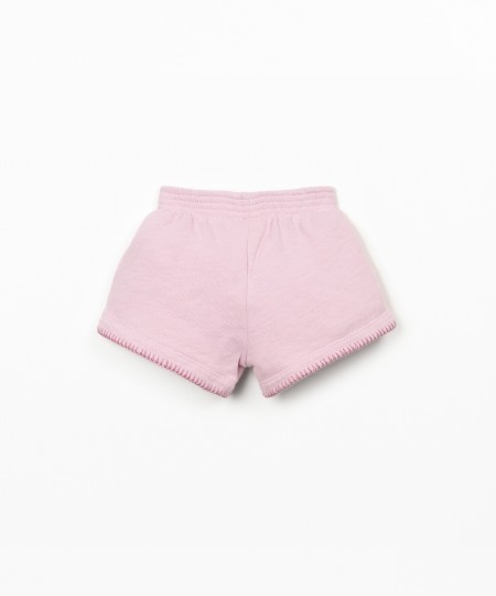 Pantalón corto con cintura elástica y lazo decorativo