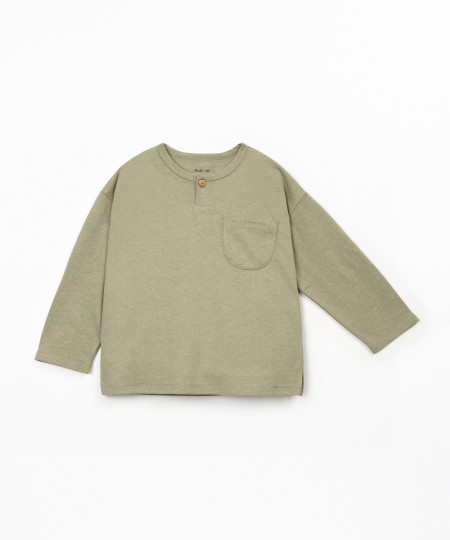Pull à manches longues avec poche poitrine