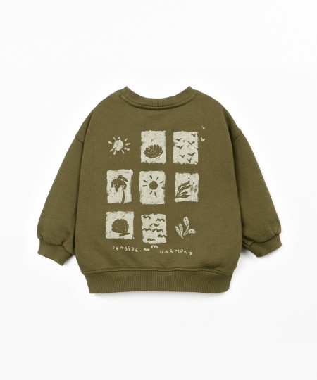 Sudadera con ilustración en la espalda