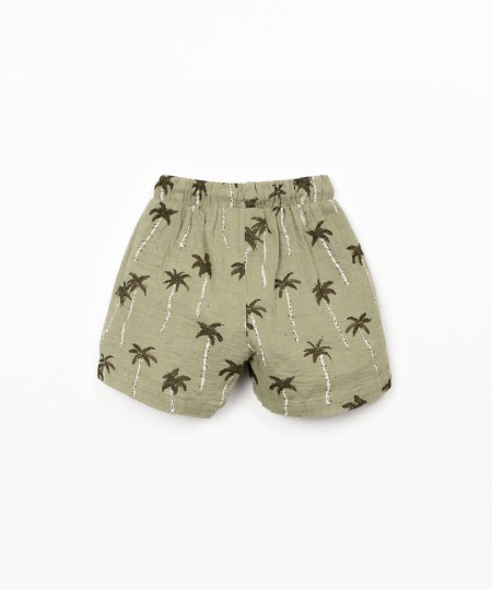Pantaloncini in cotone biologico con stampa di palme