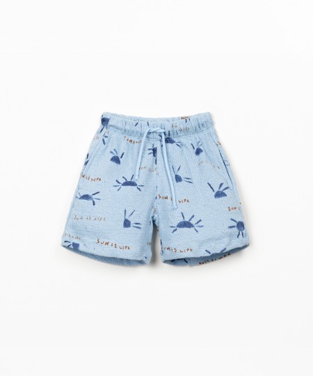 Pantaloncini in maglina con stampa di sole