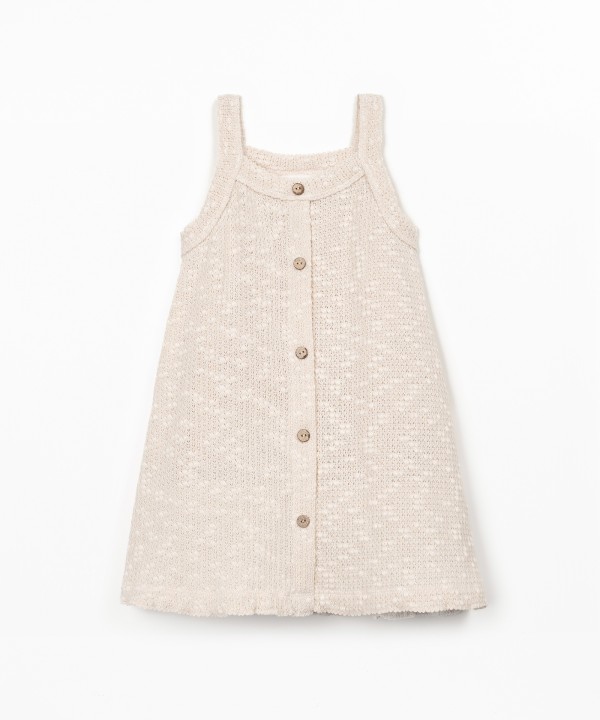 Jersey dress with crochet effect