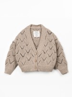 Knitted jacket with coconut buttons