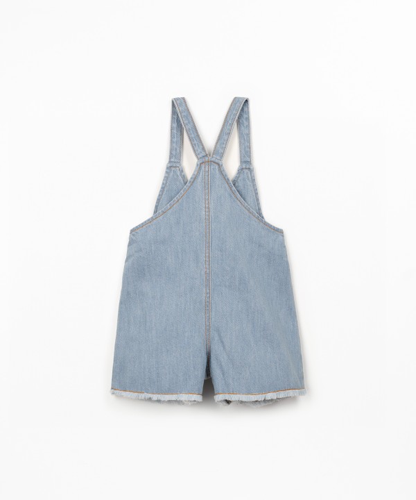 Salopette in denim con apertura frontale