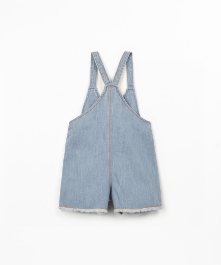 Salopette in denim con apertura frontale