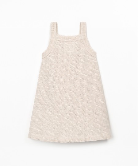 Jersey dress with crochet effect